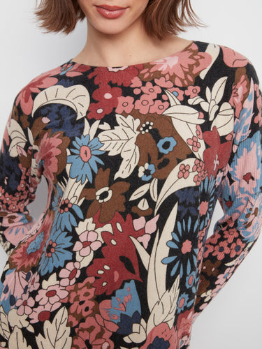 The rounded hem of this floral design offers a flattering silhouette, perfect for casual wear by Charlie B.