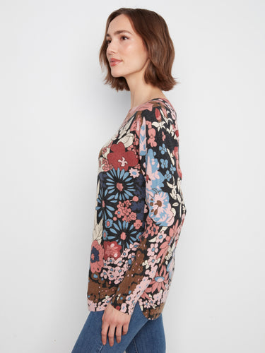 Complete with convenient side pockets, this floral top combines fashion and functionality effortlessly by Charlie B.