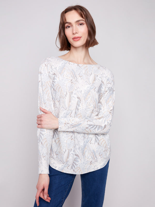 Embrace comfort with this foliage sweater, designed with convenient side slits by Charlie B.