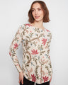 Floral-patterned top with a boat neckline, featuring drop shoulders for a relaxed fit. Finished by Charlie B.