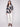 Granite sweater showcasing its elegant rounded hem and convenient side pockets, perfect for casual outings by Charlie B.