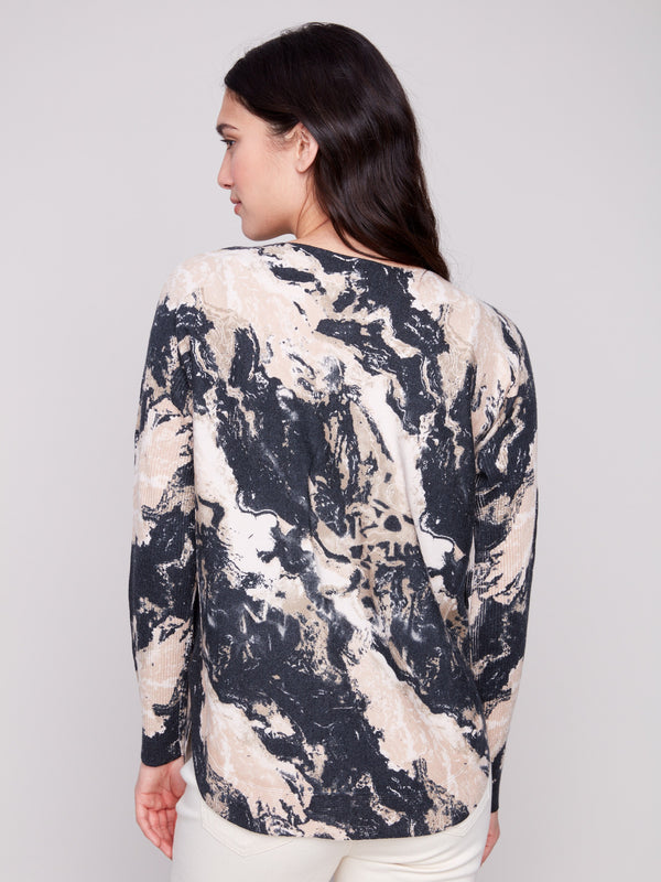 Granite sweater with an artistic marbled design, highlighted by subtle side slits that add flair to the look by Charlie B.