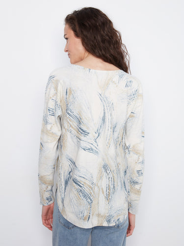 Chic sweater showcasing side pockets and a modern abstract design for added functionality by Charlie B.