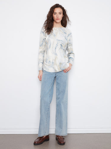 Versatile sweater with long sleeves and eye-catching pattern, ideal for everyday wear by Charlie B.