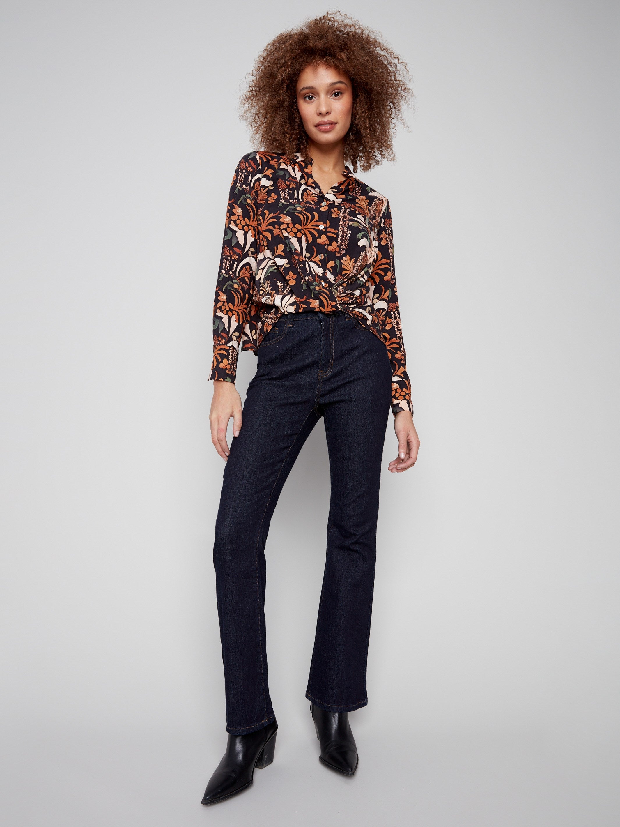 Button-down floral batik shirt with intricate twisted front detail, offering both style and comfort by Charlie B.