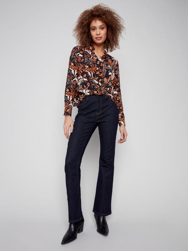 Button-down floral batik shirt with intricate twisted front detail, offering both style and comfort by Charlie B.