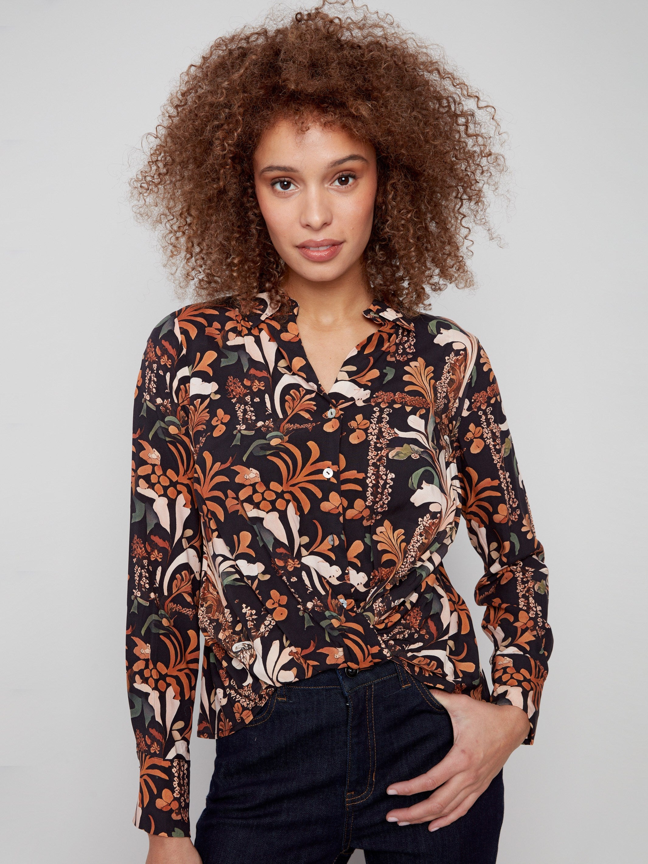 Stylish long-sleeve shirt adorned with a vibrant floral batik pattern, perfect for any occasion by Charlie B.