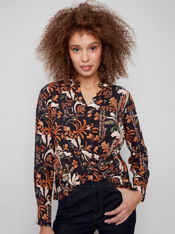 Stylish long-sleeve shirt adorned with a vibrant floral batik pattern, perfect for any occasion by Charlie B.