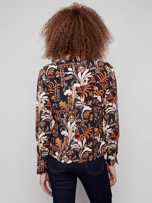 Chic floral batik patterned shirt with button-down closure, designed to elevate your wardrobe effortlessly by Charlie B.