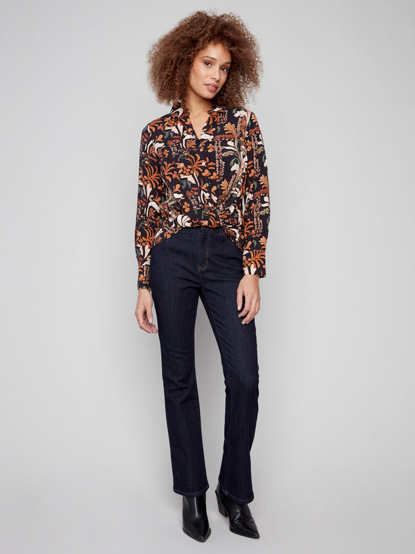 Sophisticated shirt collar neckline enhances the overall appeal of this beautifully patterned blouse by Charlie B.