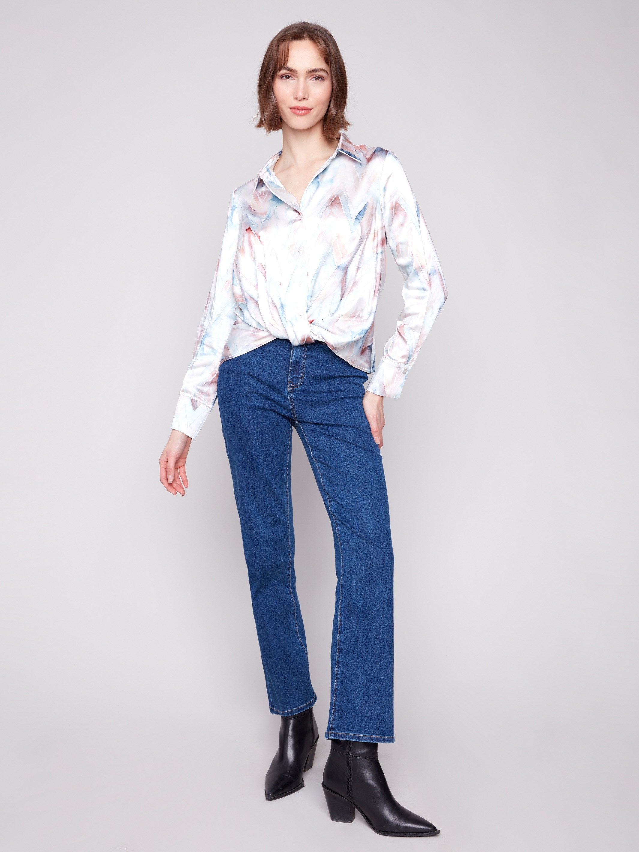 Elegant satin shirt with button-down closure and chevron print, offering a stylish twist by Charlie B.