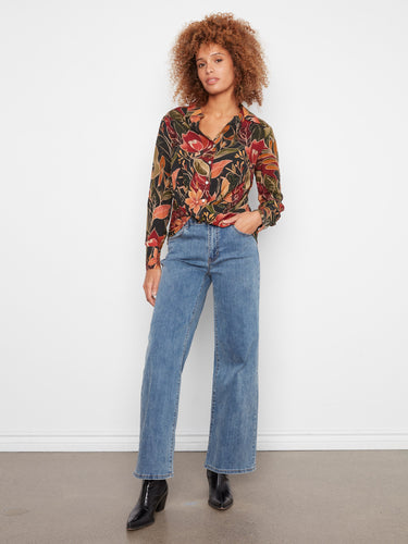 Chic twisted front detail on this floral blouse adds a unique touch to your everyday style by Charlie B.