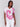 Pink dolman top with a split neckline, showcasing its short sleeves by Charlie B.
