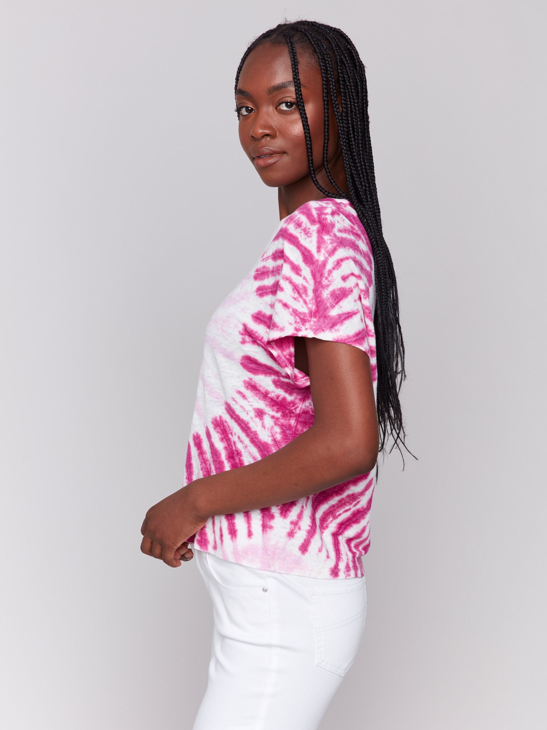 Dolman top in pink with spiral tie-dye pattern and split neckline by Charlie B.