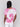 Relaxed fit pink dolman featuring a vibrant tie-dye design by Charlie B.