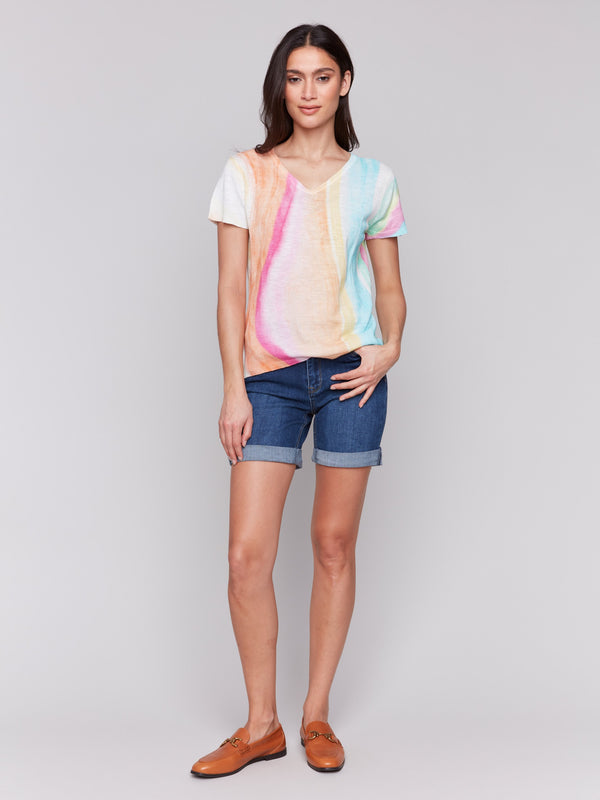 V-neck sweater featuring a lively rainbow design, perfect for adding color to your wardrobe by Charlie B.
