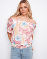 Floral top with a charming off-the-shoulder design, perfect for a breezy summer look by Charlie B.