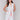 Knee-length dress with geometric patterns and waist drawstring by Charlie B.