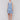 Knee length blue and white ikat print dress with a waist drawstring by Charlie B.
