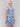 Elegant waist drawstring complements the ruffle details on this ikat dress by Charlie B.