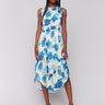 Matte satin dress with a smocked waistband and floral print by Charlie B.