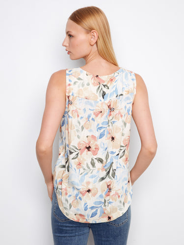 Beautifully designed floral top showcasing a scoop neckline and rounded hem, enhancing your everyday look by Charlie B.