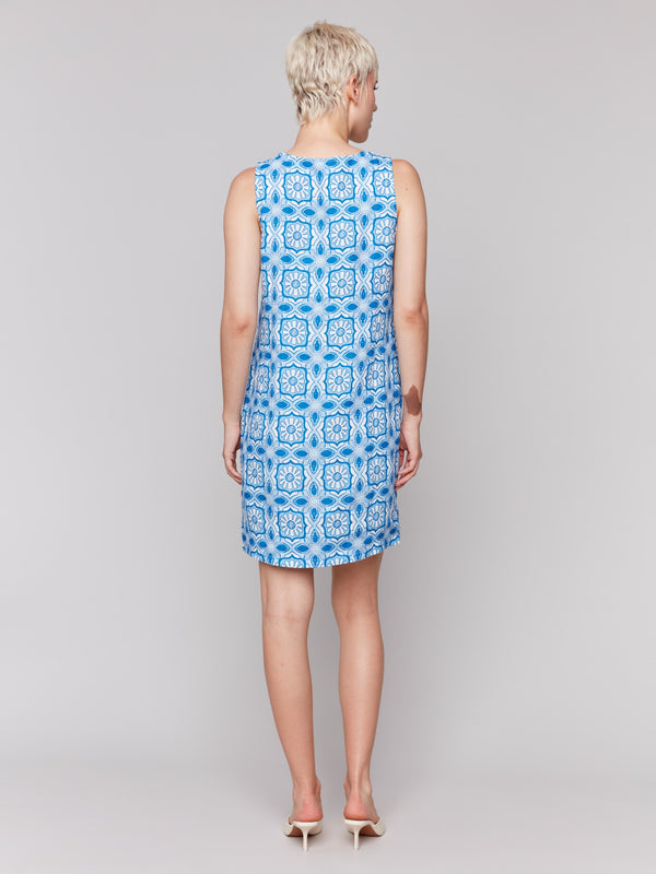 Chic sleeveless dress with versatile knee-length fit, perfect for any occasion by Charlie B.