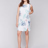 Floral pattern dress with a crew neck and knee length design by Charlie B.