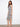 Stylish midi-length dress with beautiful side slits, offering both comfort and elegance. By Charlie B.