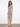This fashionable dress combines a scoop neckline with intricate detailing, making it a versatile choice. By Charlie B.