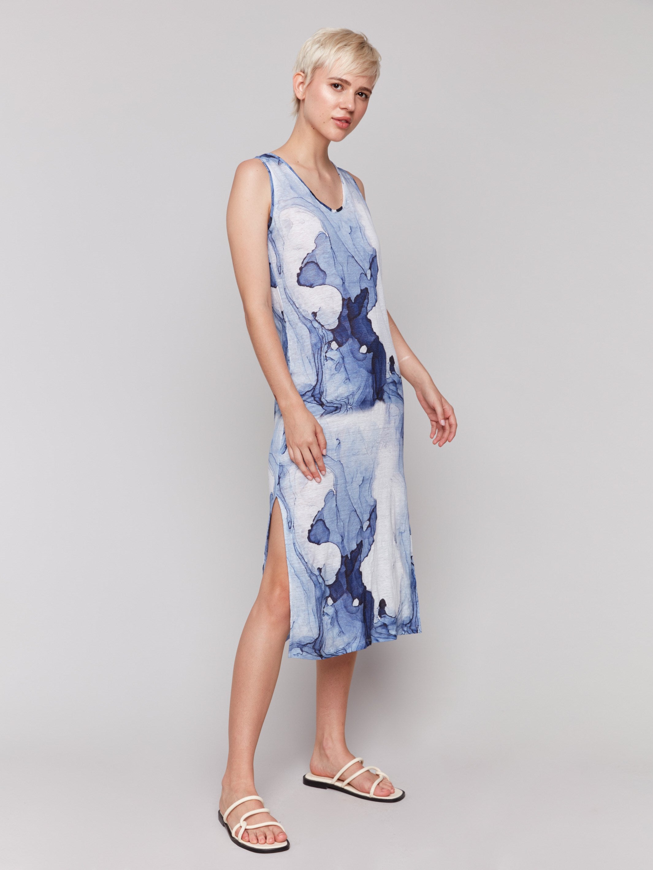 Dress featuring a sleeveless design and abstract ink pattern by Charlie B.