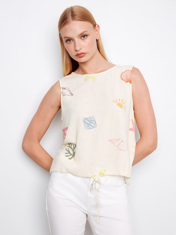 Linen blend top showcasing a sleeveless design and ocean-themed abstract print, perfect for summer vibes by Charlie B.