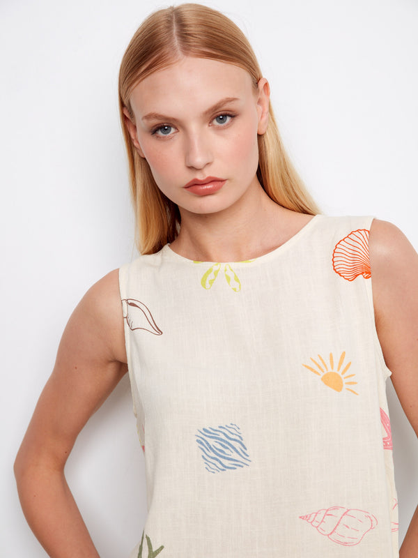 This top features a crew neckline and vibrant ocean-inspired print, ideal for casual outings by Charlie B.