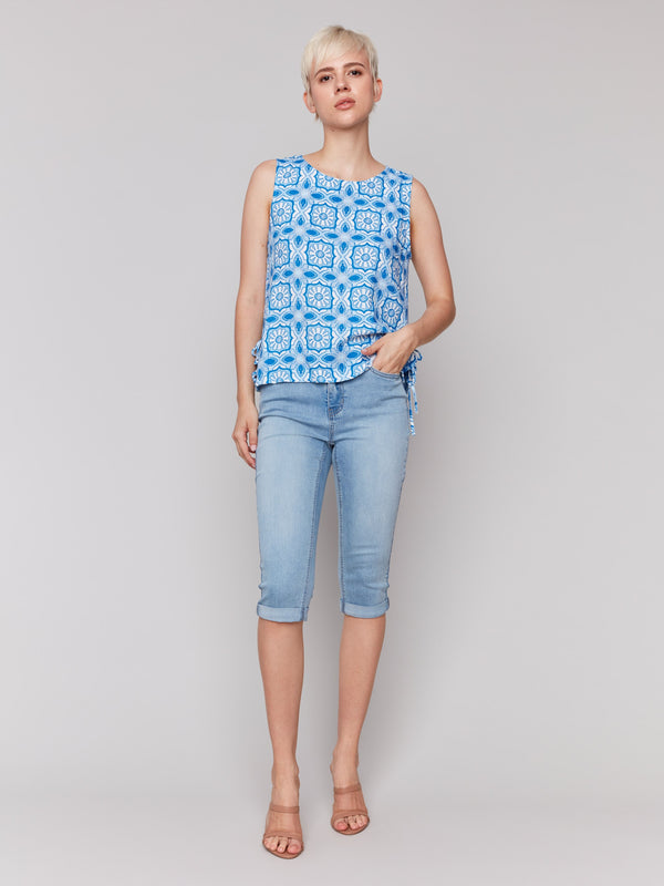 Relaxed fit top showcasing an intricate illusion pattern by Charlie B.