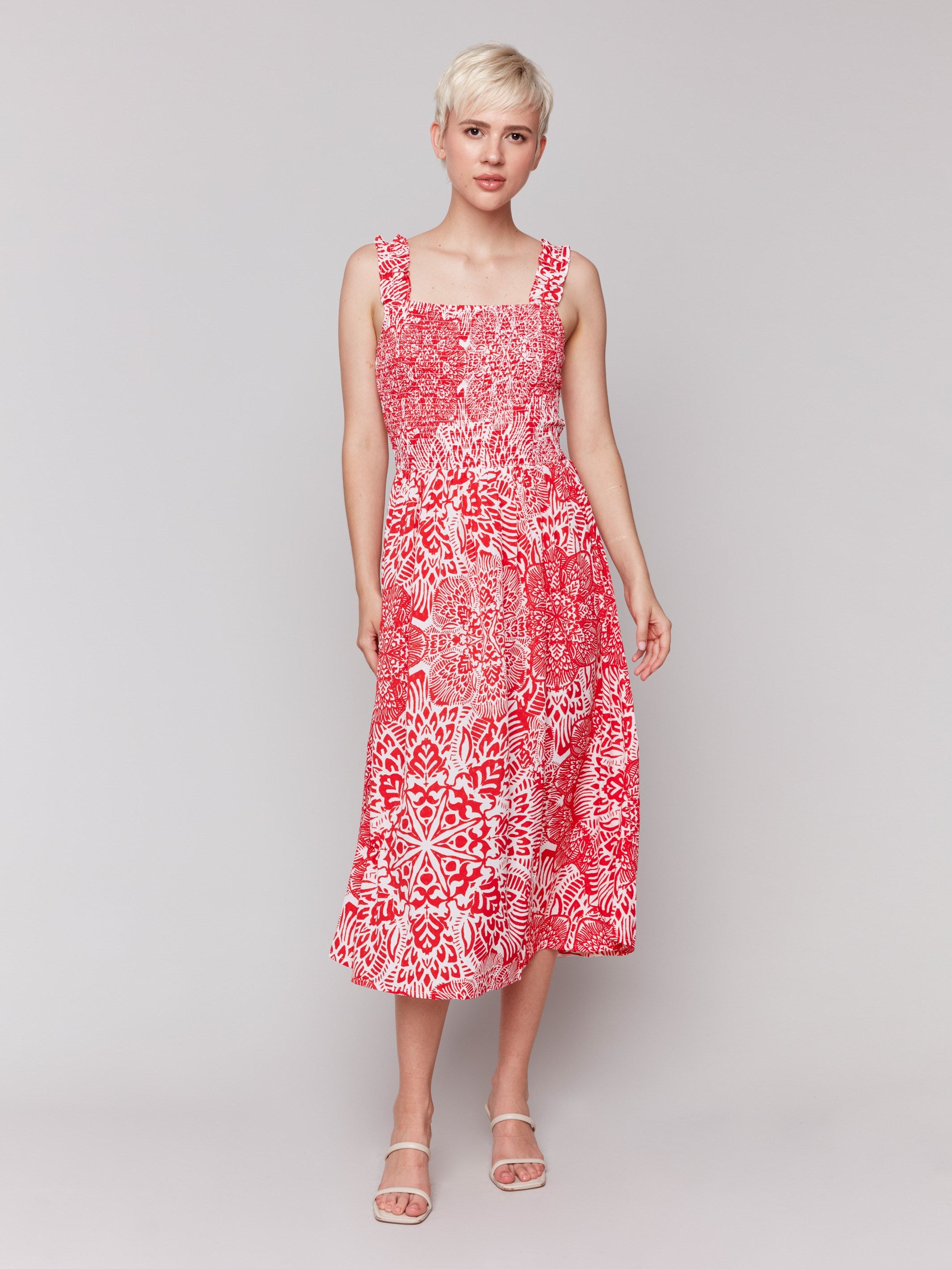 Sleeveless red and white printed dress by Charlie B.