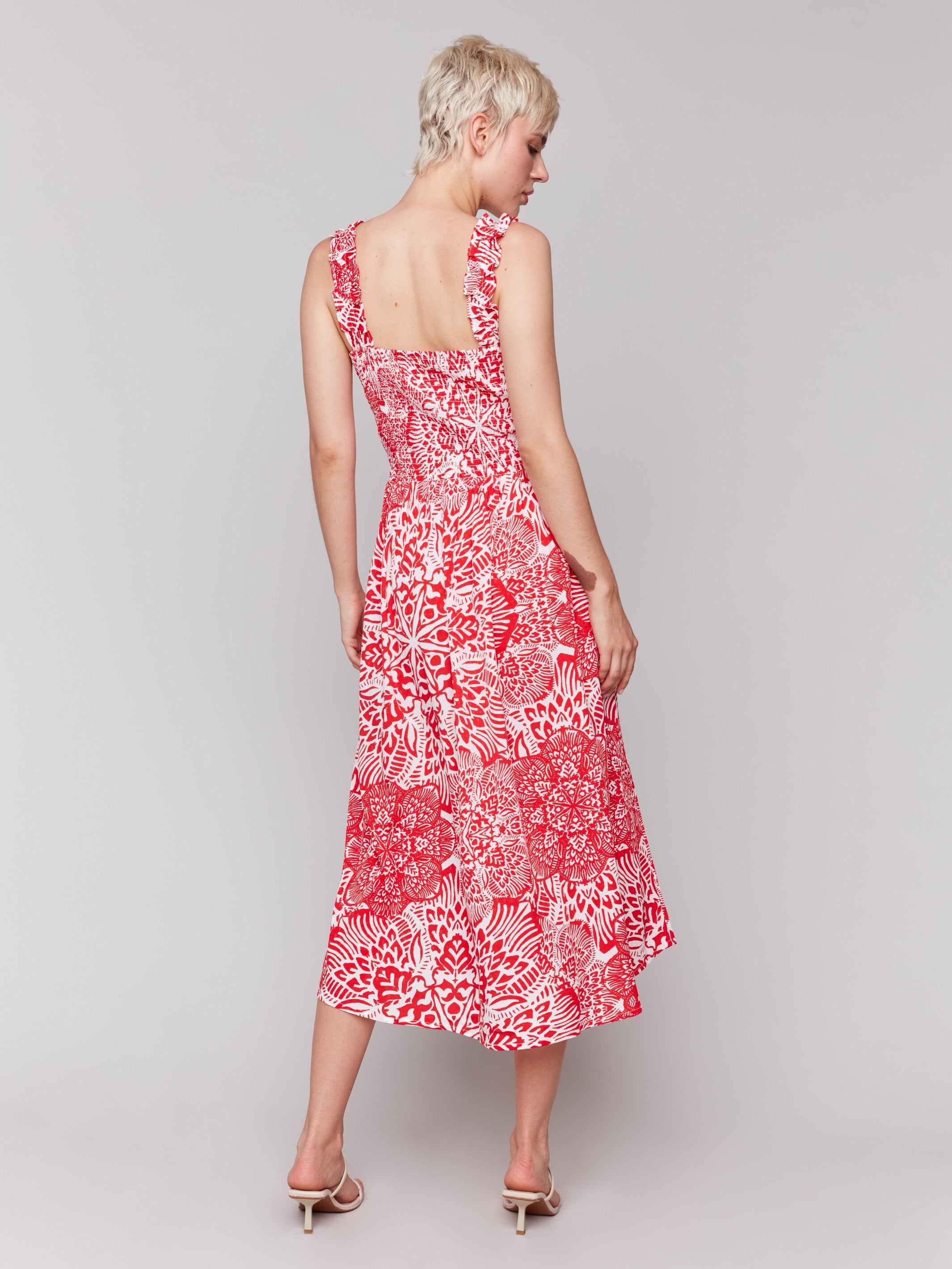 Square neckline on a stylish red and white dress by Charlie B.