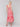 Square neckline on a stylish red and white dress by Charlie B.