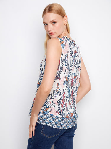 Wilderness-inspired print on this lightweight top, complete with ruffled neckline for added flair by Charlie B.