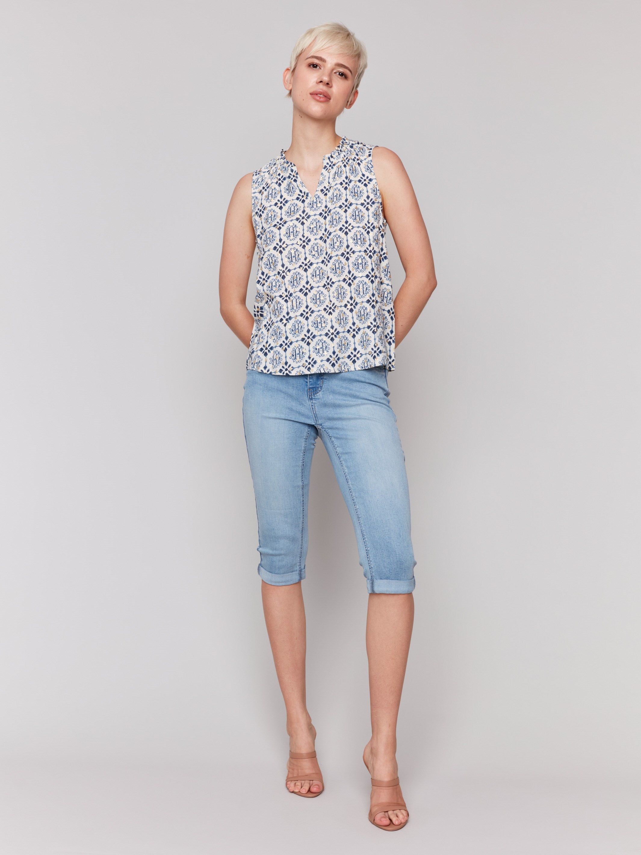Elegant blouse with intricate geometric design by Charlie B.
