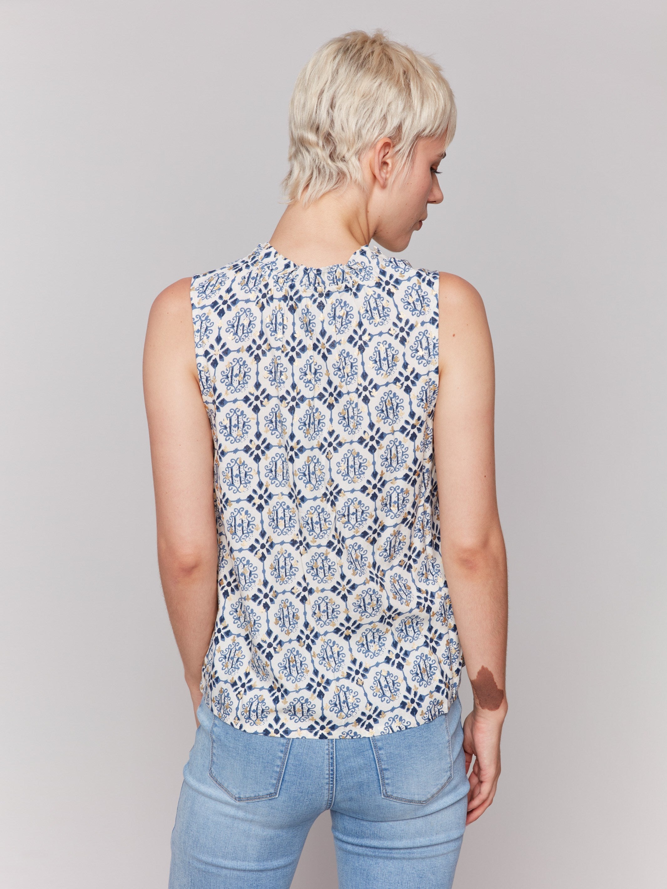 Chic sleeveless top adorned with a V-neck by Charlie B.