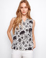 This top features a stylish V-neck design, perfect for a chic and modern look by Charlie B.