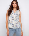 V-neck sleeveless top featuring a delicate gardenia floral print in a lightweight fabric by Charlie B.
