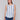 Geometric pattern sleeveless top with a rounded hem by Charlie B.