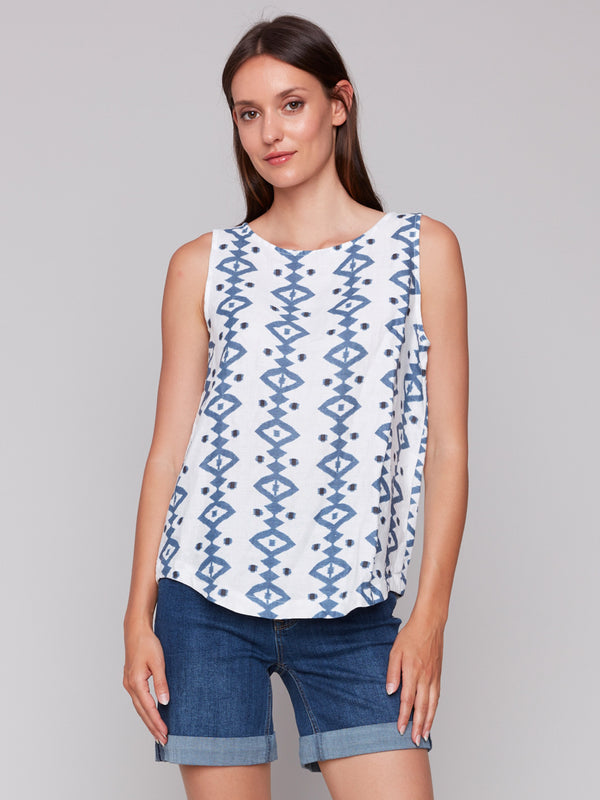 Geometric pattern sleeveless top with a rounded hem by Charlie B.