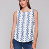 Geometric pattern sleeveless top with a rounded hem by Charlie B.