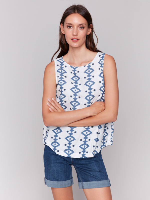 Elegant crew neckline top adorned with modern geometric shapes by Charlie B.