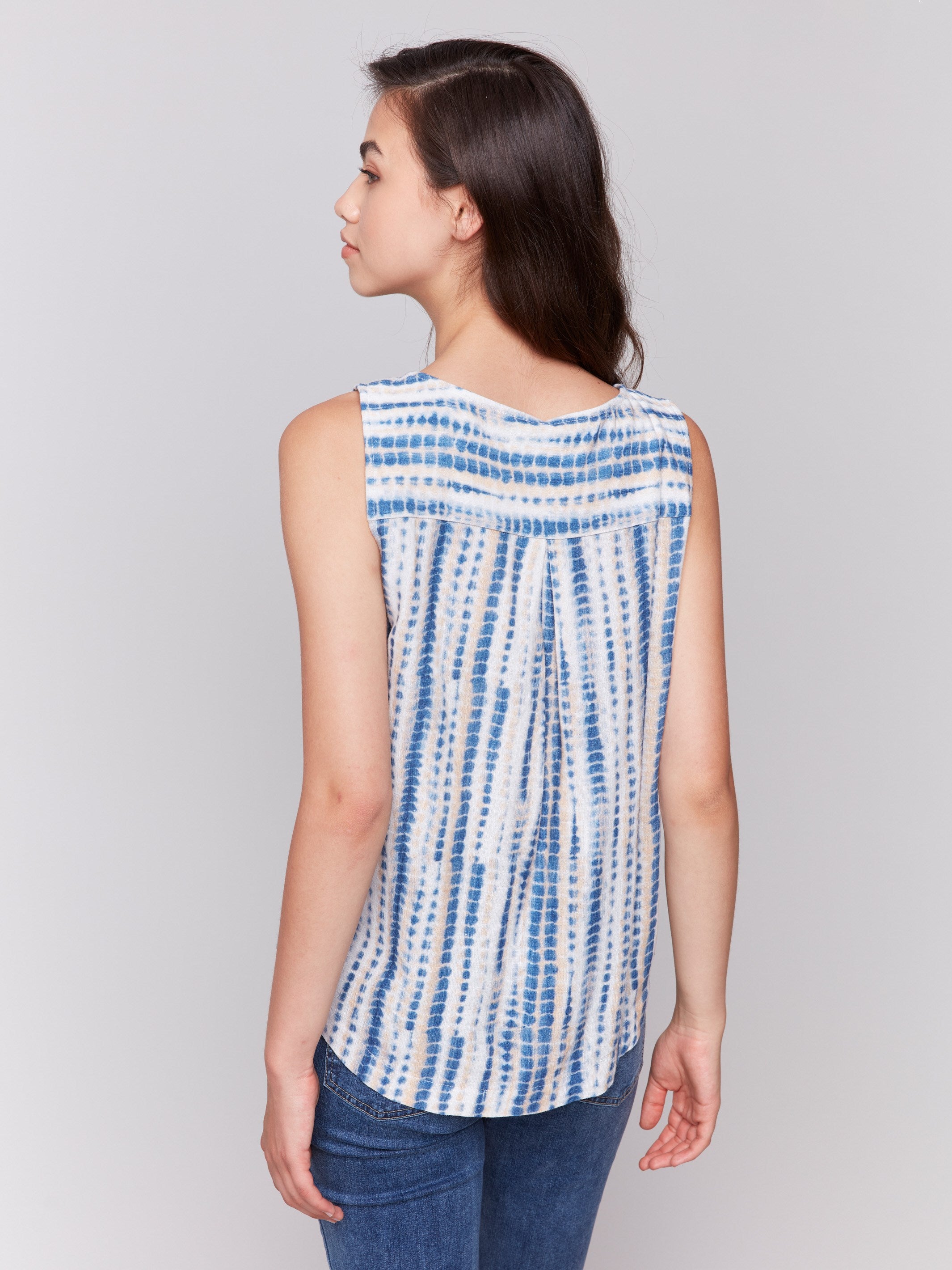 Sleeveless design top in vibrant colors by Charlie B.