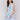 Knee-length dress with celestial floral print and tiered design by Charlie B.