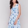 Knee-length dress with celestial floral print and tiered design by Charlie B.