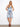 Elegant blue and white dress featuring a sleeveless design with floral patterns, perfect for sunny days by Charlie B.